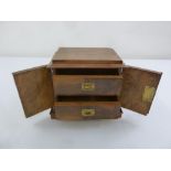 A Victorian mahogany rectangular desk specimen cabinet with two drawers and brass handles