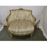 A French 19th century salon chair on four turned tapering legs