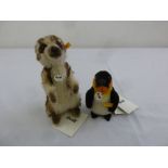 Two Steiff genuine Mohair animals, a Meerkat, Cockie 045257 and a Penguin, Hippie 045677, both