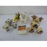 A quantity of Art Deco style porcelain to include teasets and figurines