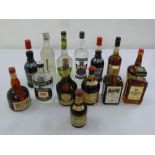 A quantity of liqueur, vodka and gin to include Benedictine, Drambuie, Cointreau, Smirnoff Blue