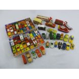 A quantity of Corgi, Dinky and Lesney diecast cars, trucks and buses, all playworn