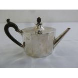 A Victorian silver teapot, panel form with fruitwood carved pineapple finial and fruitwood handle,