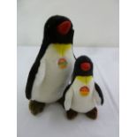 Two Steiff Penguins, Charly 063619 and 057977, both with button and label