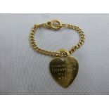 Tiffany and Co. 14ct yellow gold heart pendant M3910 on a 14ct gold chain, approx total weight 7.2g