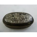 An early 19th century Continental shaped oval tortoiseshell snuff box with inlaid silver