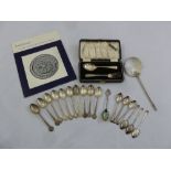A quantity of teaspoons to include Lindesfarne hallmarked silver teaspoons, a cased spoon and fork