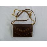 Aspreys brown crocodile skin leather handbag with gilt chain