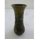 Moorcroft vase brown ground decorated with stylised peacock feathers, marks to the base, 20.5cm (h)