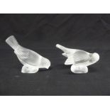 A pair of Lalique frosted glass figurines of birds, marks to the bases