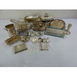 A quantity of silver plate to include trays, dishes, a teaset and flatware