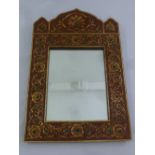 A Moroccan shaped rectangular red lacquered and gilded floral wall mirror