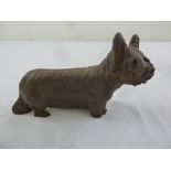 A Meissen Botter Steinzeug unglazed figurine of a dog, marks to the base