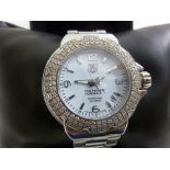 TAG Heuer Formula 1 stainless steel ladies wristwatch with diamond bezel to include original