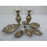 A quantity of silver to include a pair of vases and five bonbon dishes