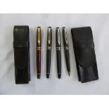 A quantity of Watermans pens to include two fountain pens, a ballpoint pen and a retractable