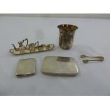 A quantity of silver to include a miniature teaset and tray, two cigarette cases and a Kiddush cup