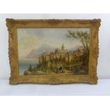 A framed oil on canvas of an Italian lake with a villa in the foreground, indistinctly signed bottom