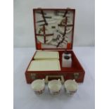 Brexton 1960s picnic set to include plates, cups, containers and utensils in original red leather