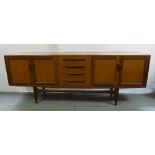 G-Plan rectangular teak sideboard with cupboards and drawers on four tapering supports