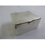 A silver Britannia standard square cigarette box with Bakelite interior
