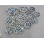 A quantity of Meissen onion pattern plates and bowls of various sizes, marks to the base A/F (11)