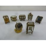 Six late Victorian jewellery glass and gilded metal caskets and watch holder (7)