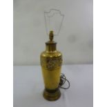 A German brass Art Nouveau style table lamp with raised circular base