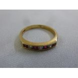 9ct yellow gold ruby and diamond ring, approx total weight 2.6g