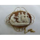 9ct gold brooch with a carved cameo depicting a classical scene