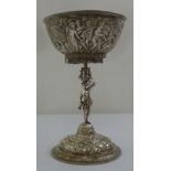 A 19th century Continental white metal centrepiece the bowl heavily chased with classical figures