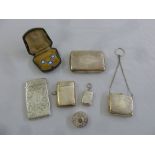 A quantity of hallmarked silver to include a card case, a coin purse, a cased set of enamel studs