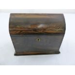 A Victorian lancet form coromandel tea caddy with brass escutcheon