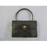 Gucci ladies vintage crocodile skin handbag with gilt metal and tigers eye clasp, A/F