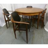 G-Plan circular dining table with one drop in leaf and four matching chairs