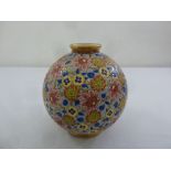 French early 20th century enamelled vase of globular form decorated with flowers and leaves