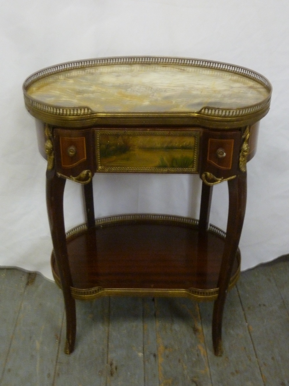 A French kidney shaped marble top side table with gilt metal gallery and single drawer with