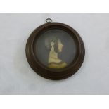 A framed and glazed wax miniature of a noble lady, label to verso,