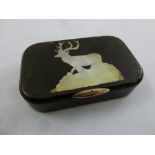 An early 19th century rounded rectangular snuff box with a mother of pearl inlaid stag to hinged