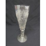 A Victorian wine glass with engraved flowers and leaves, twist stem on circular base, 40cm (h)