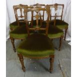 A set of six Victorian mahogany dining chairs carved backs and upholstered seats
