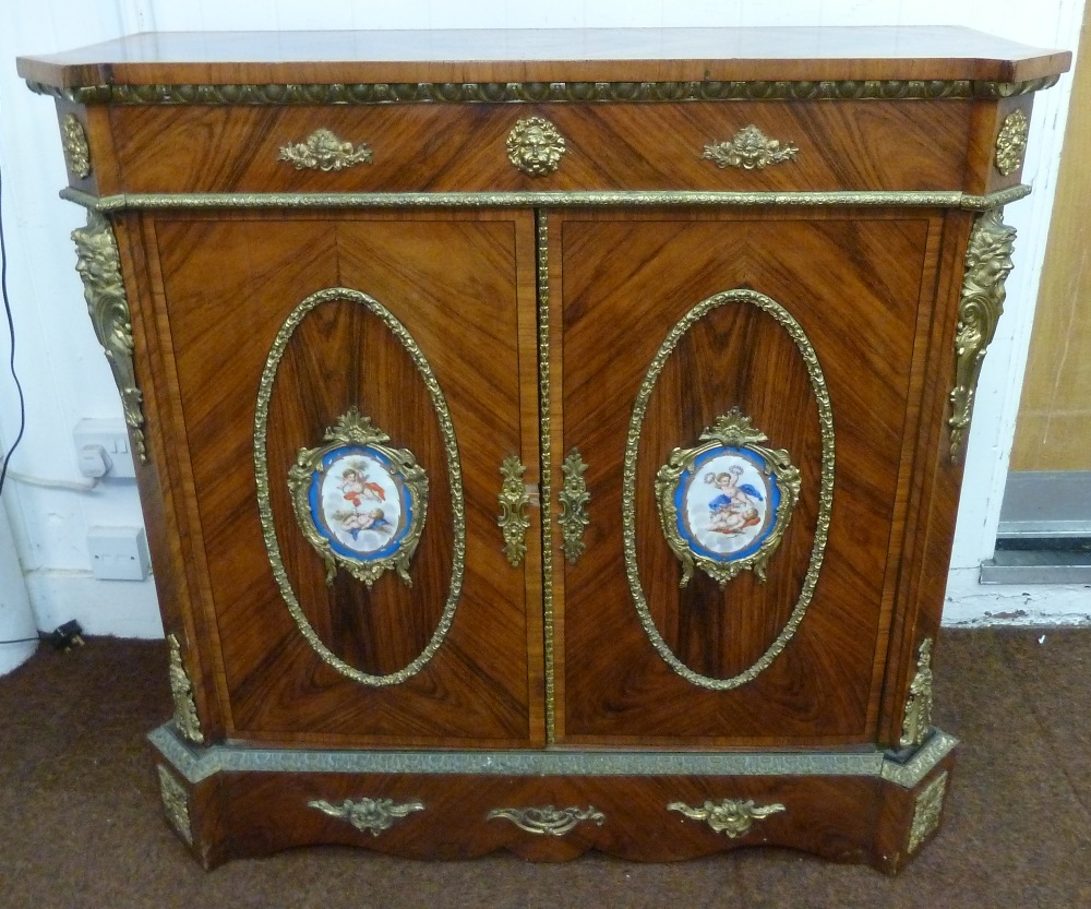 Louis XVI style cabinet with gilded metal mounts and hand painted Sevres style porcelain plaques