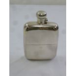 A silver hip flask, rounded rectangular with pull-off beaker and bayonet fitting hinged cover,