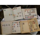 4 vintage postage stamp albums