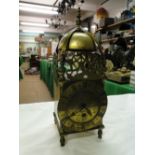 A brass lantern clock