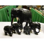 5 carved ebony elephants