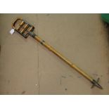 A vintage bamboo shooting stick