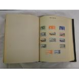 A Postage stamp album including an 1840 Penny Black, Victorian Penny Reds,