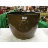 A large Art Nouveau copper pot