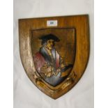 "The Fine Art Trade Guild" shield mounted on an oak plaque